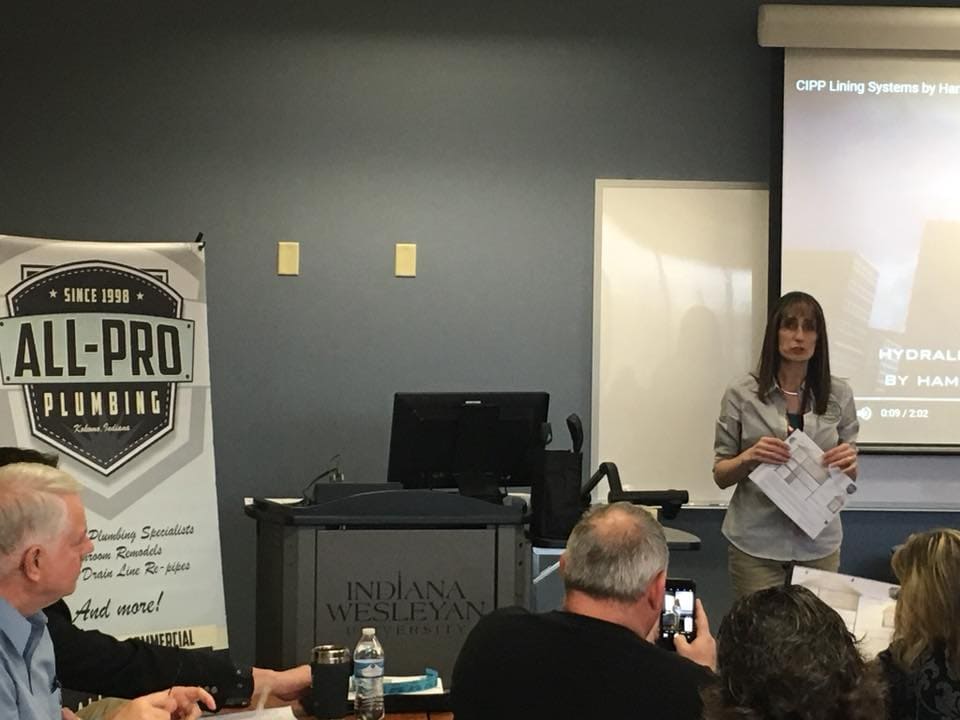 Kim Tracy of All-Pro Plumbing giving a CIPP lining presentation to a local business group in Kokomo, IN