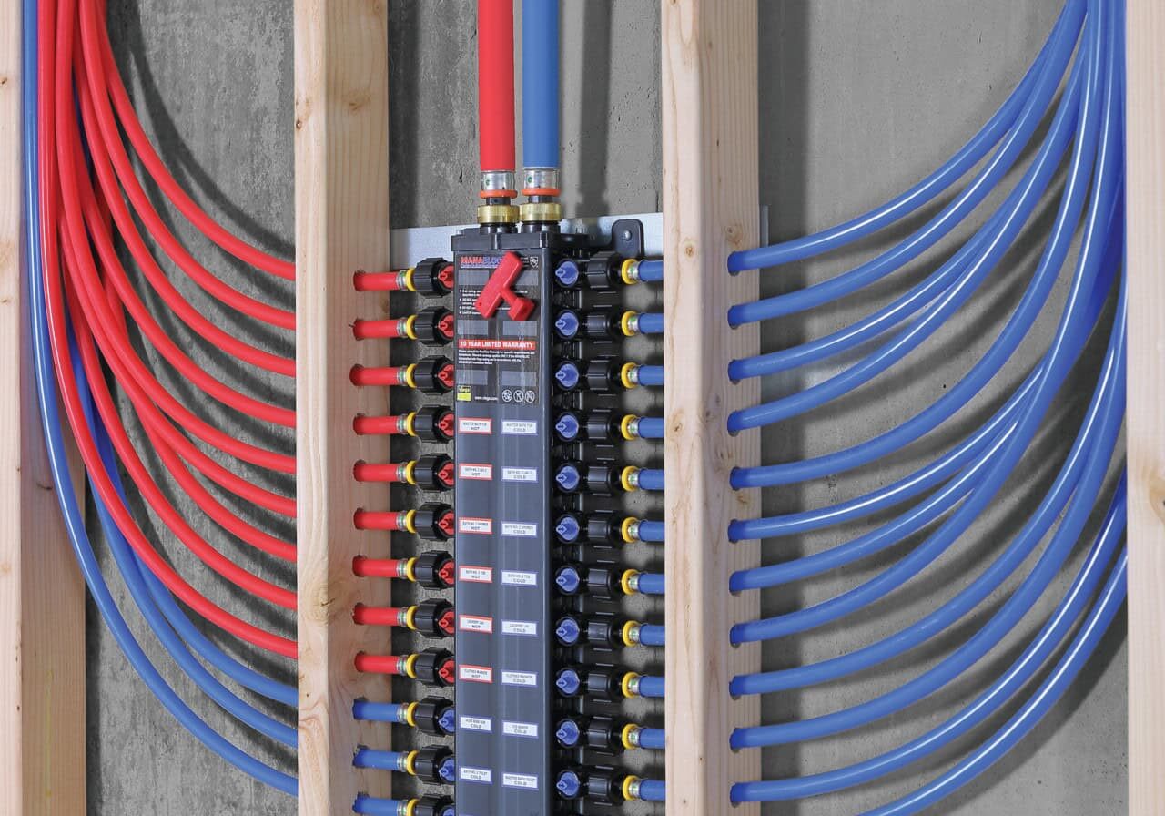 21 Water Lines Pex Uponor Manabloc Manablock Shut-off Repipe Manabloc plumbing manifold system with multiple PEX hot and cold water lines and individual shut-off valves, demonstrating modern water line repiping by All-Pro Plumbing in Kokomo, IN
