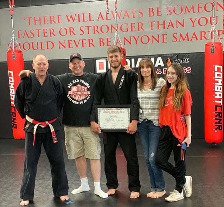 Our son with Sensei Gruel, receiving his black belt in Mixed Martial Arts at Indiana Martial Arts & Fitness